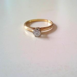 Gold and diamond ring